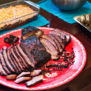 Plated brisket dinner with mac and cheese