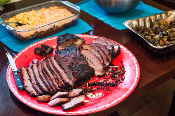 Plated brisket dinner with mac and cheese