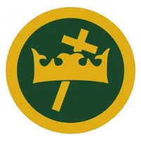 A yellow crown with a tilted cross on a green circle outlined in yellow.